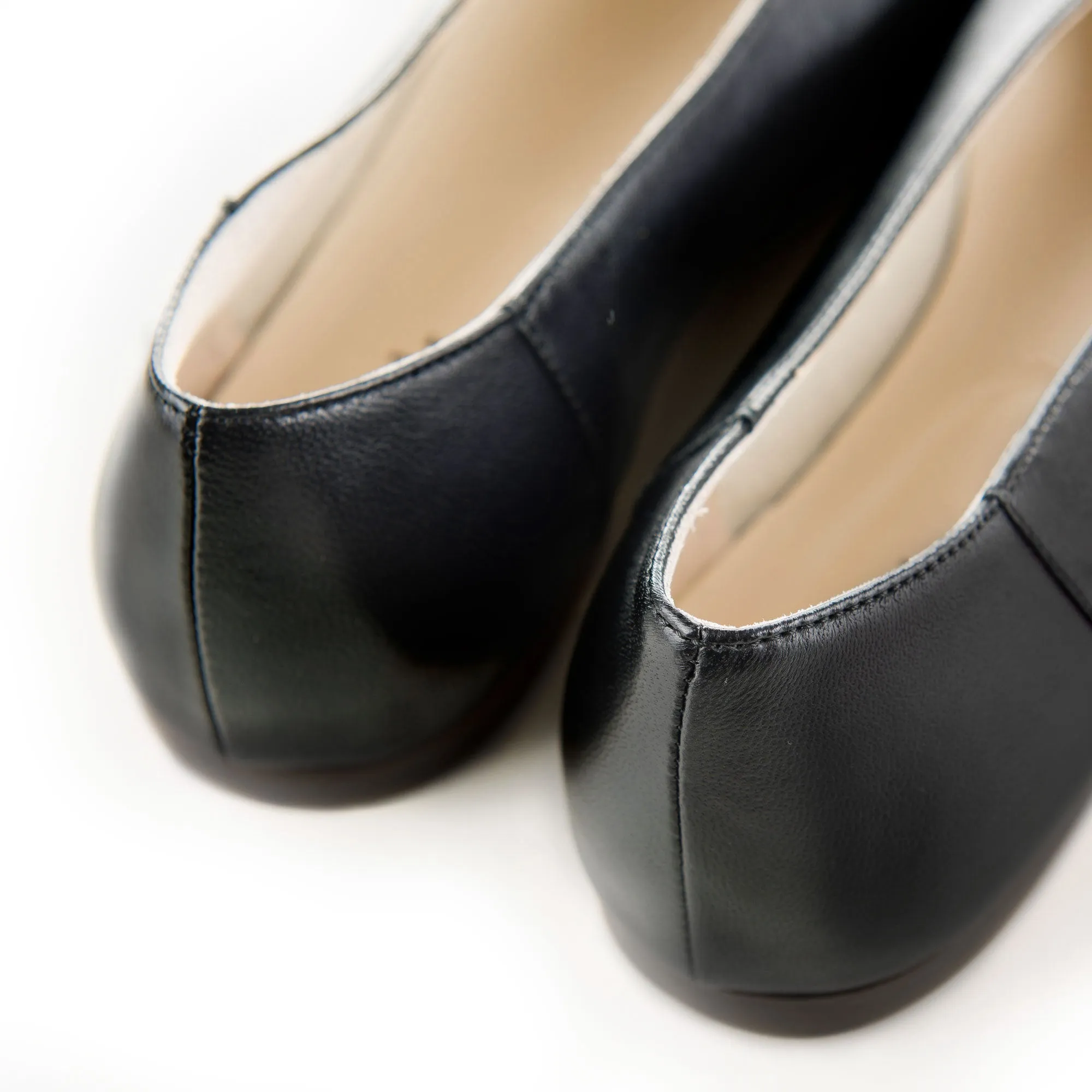 Black leather high vamp flats