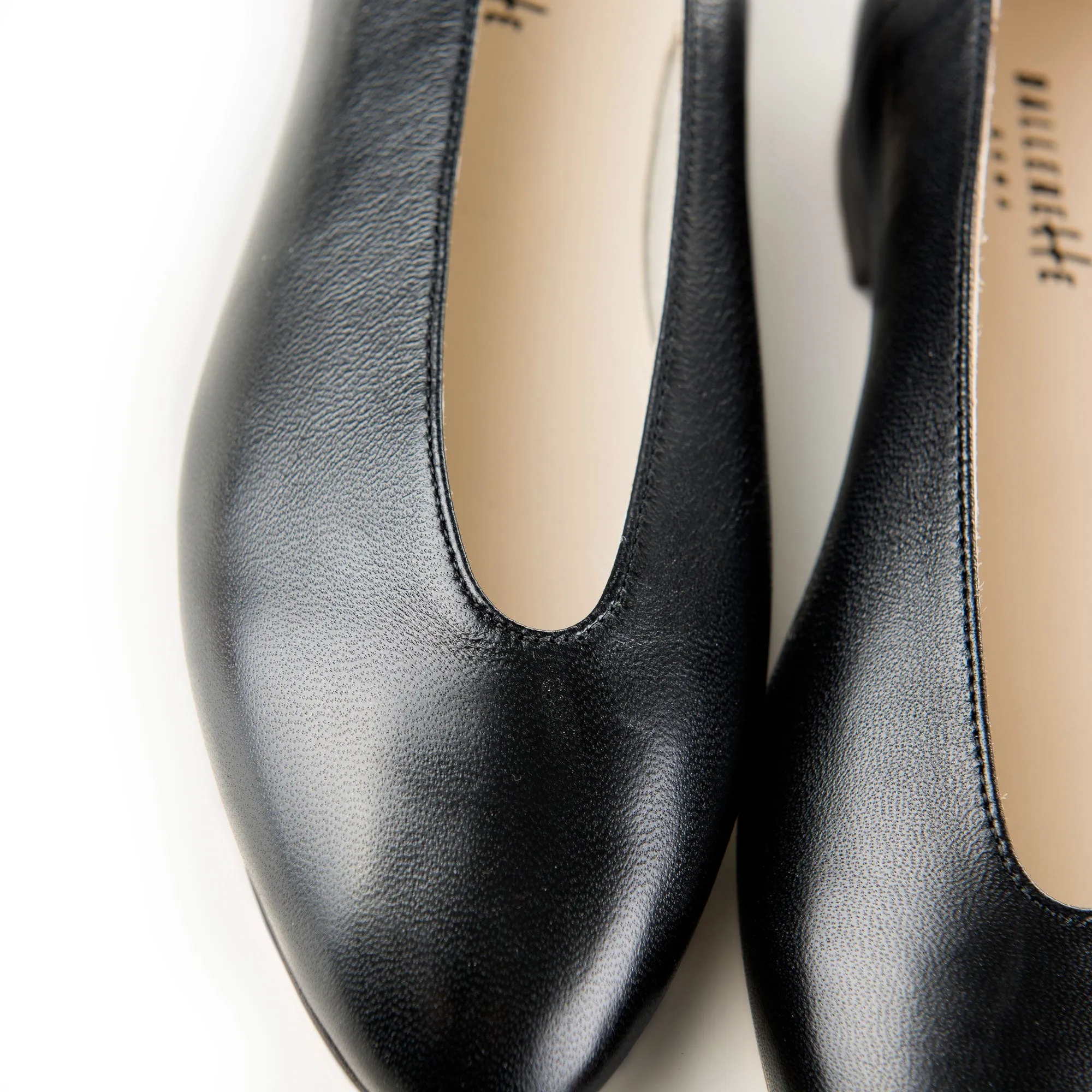 Black leather high vamp flats