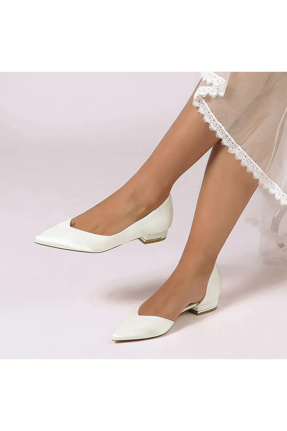 Ivory Flat Shoes with a Sleek Design