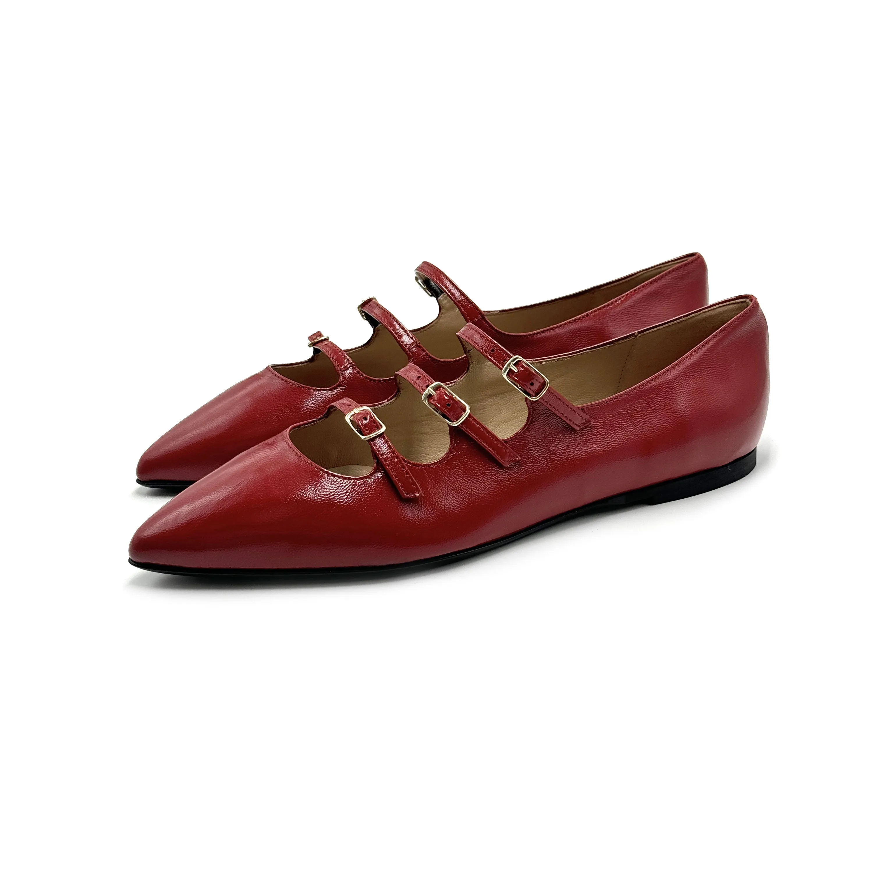 Red shiny pointed-toe ballet flats with straps