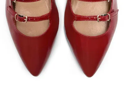 Red shiny pointed-toe ballet flats with straps